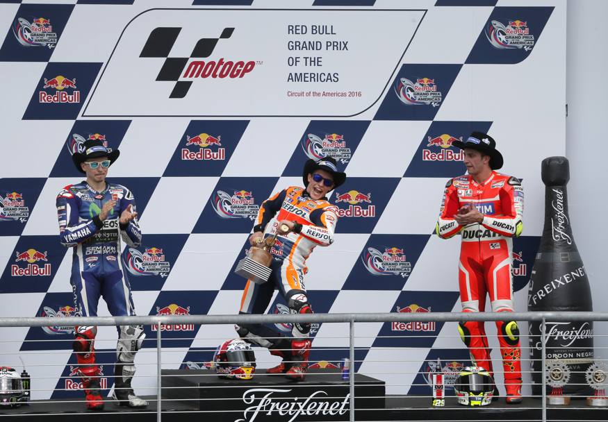 Il podio del Gp delle Americhe: da sinistra Jorge Lorenzo, secondo, Marc Marquez, vincitore, ed Andrea Iannone, terzo. AP